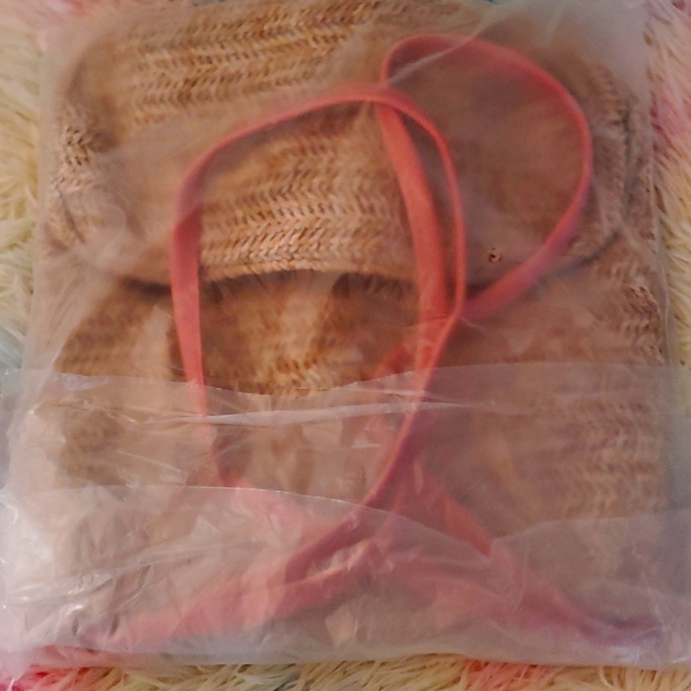Purse pink strap, tan mesh body.